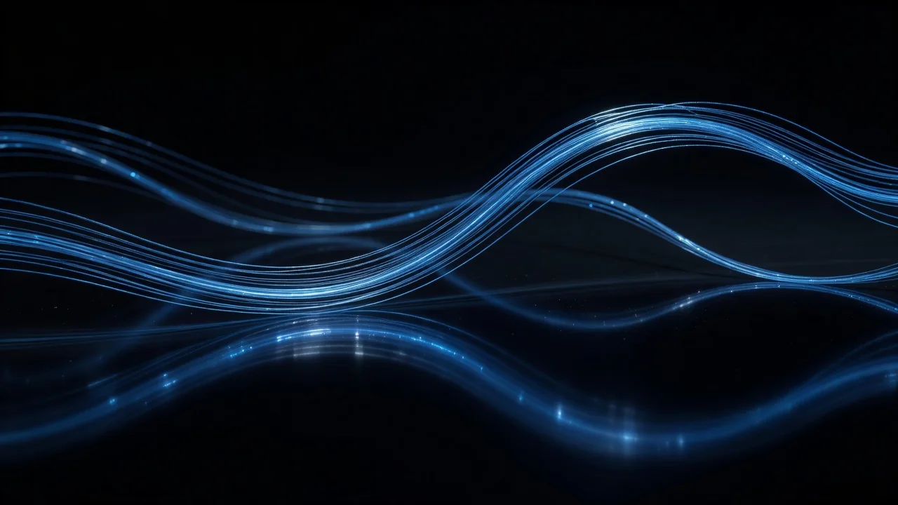 Glowing blue fibre optic strands curving across a dark reflective surface